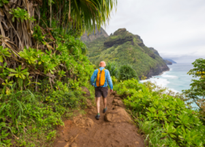 A person hiking through tropical forests in Hawaii
