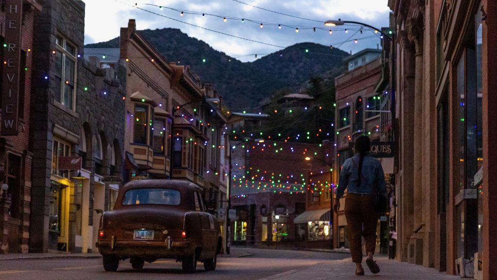 Woman walking down street in Bisbee, AZ
